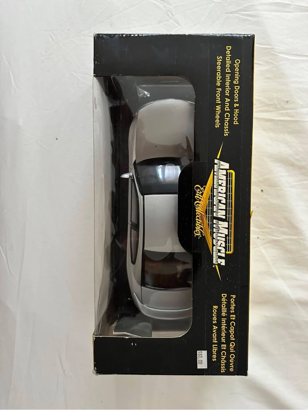 ERTL Collectible - 2004 Pontiac GTO Silver Model Car with Opening Doors